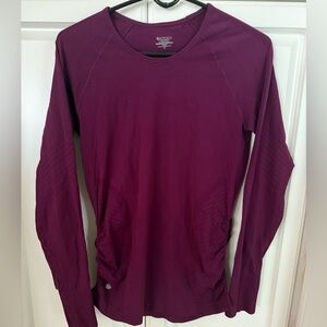 Athleta burgundy long sleeve nylon/spandex top.  Size M